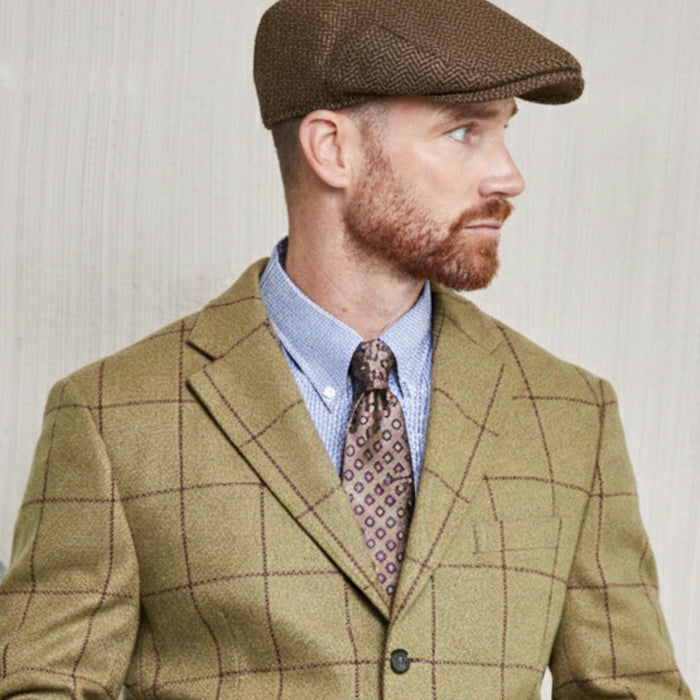 Tweed Cap in braun/fischgrät aus Moon Tweed