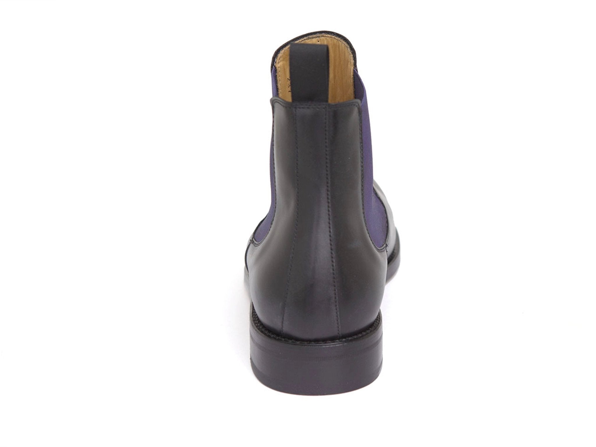 Chelsea Boots in in schwarz mit lila Einsatz