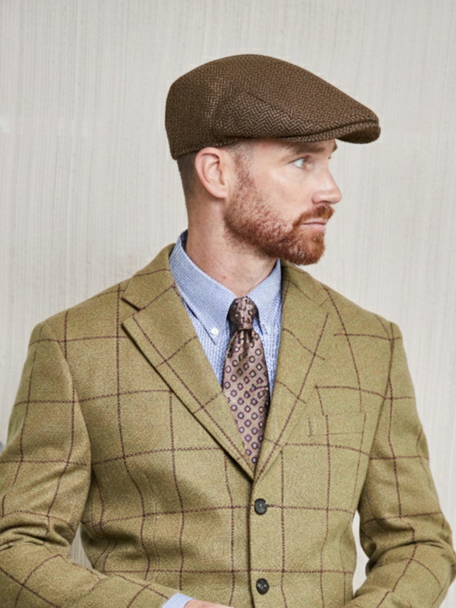 Tweed Cap in braun/fischgrät aus Moon Tweed
