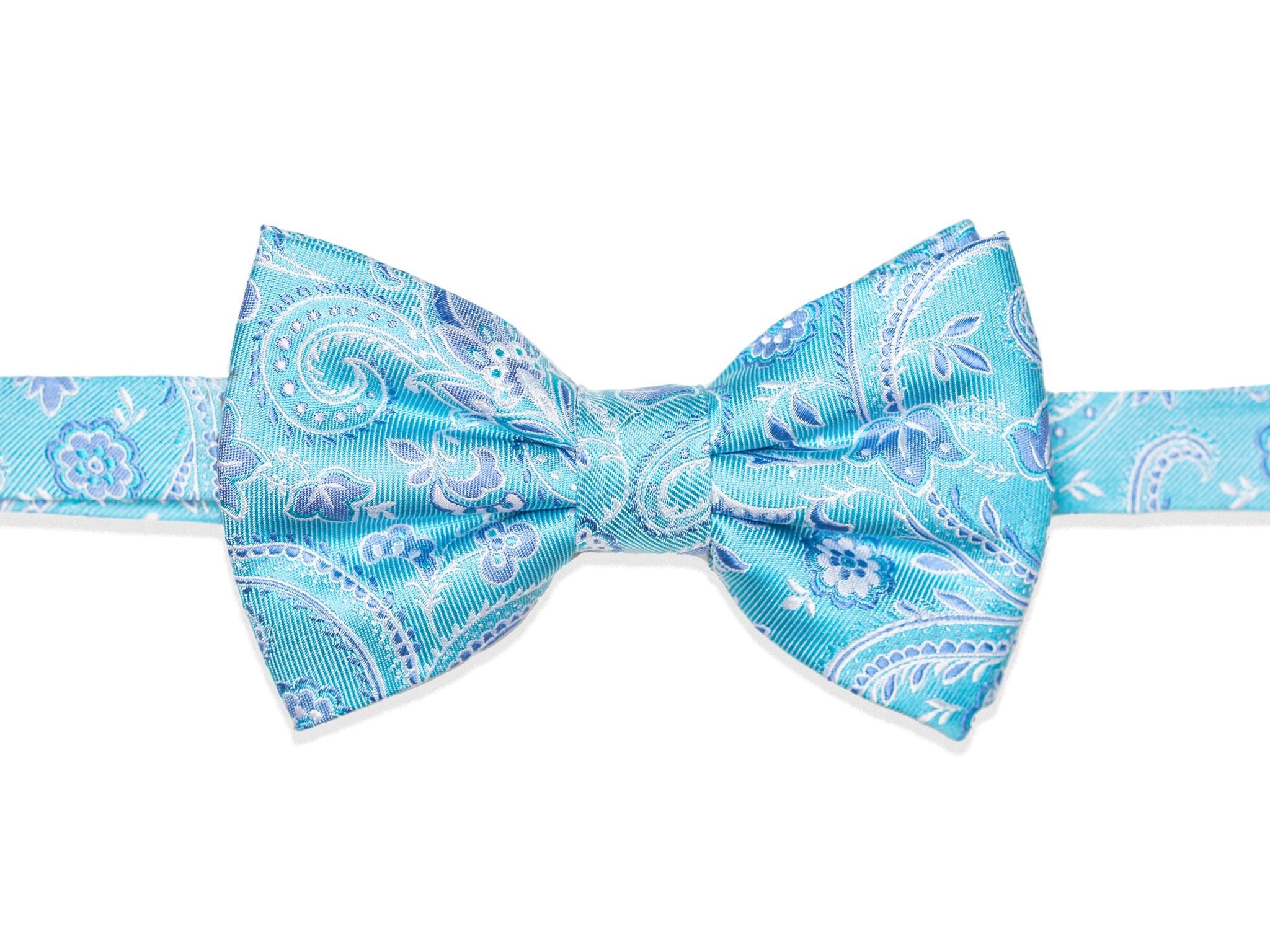 Fliege mit floralem Muster in türkis